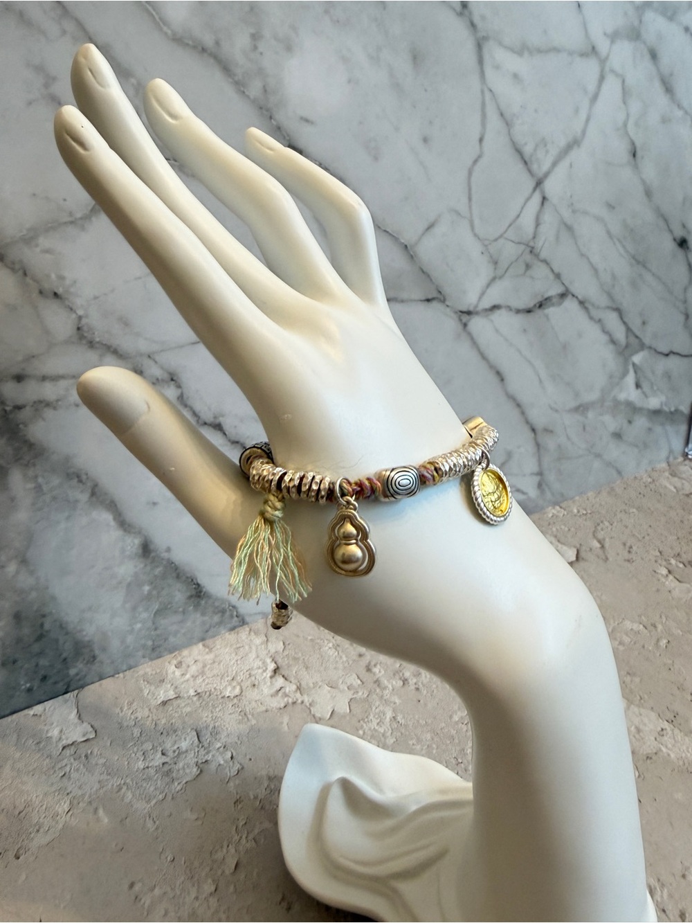 Gold-Tone Charm Bracelet with Yellow Tassel